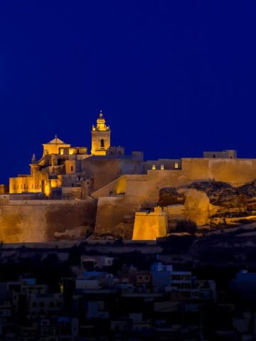 The Citadella illuminated at night in Victoria, Gozo