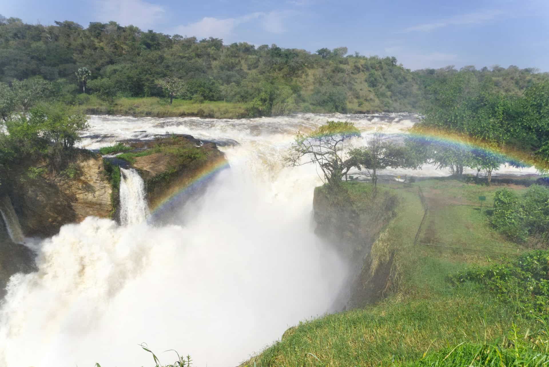 Murchison Falls in Uganda with rainbow over the Nile River
