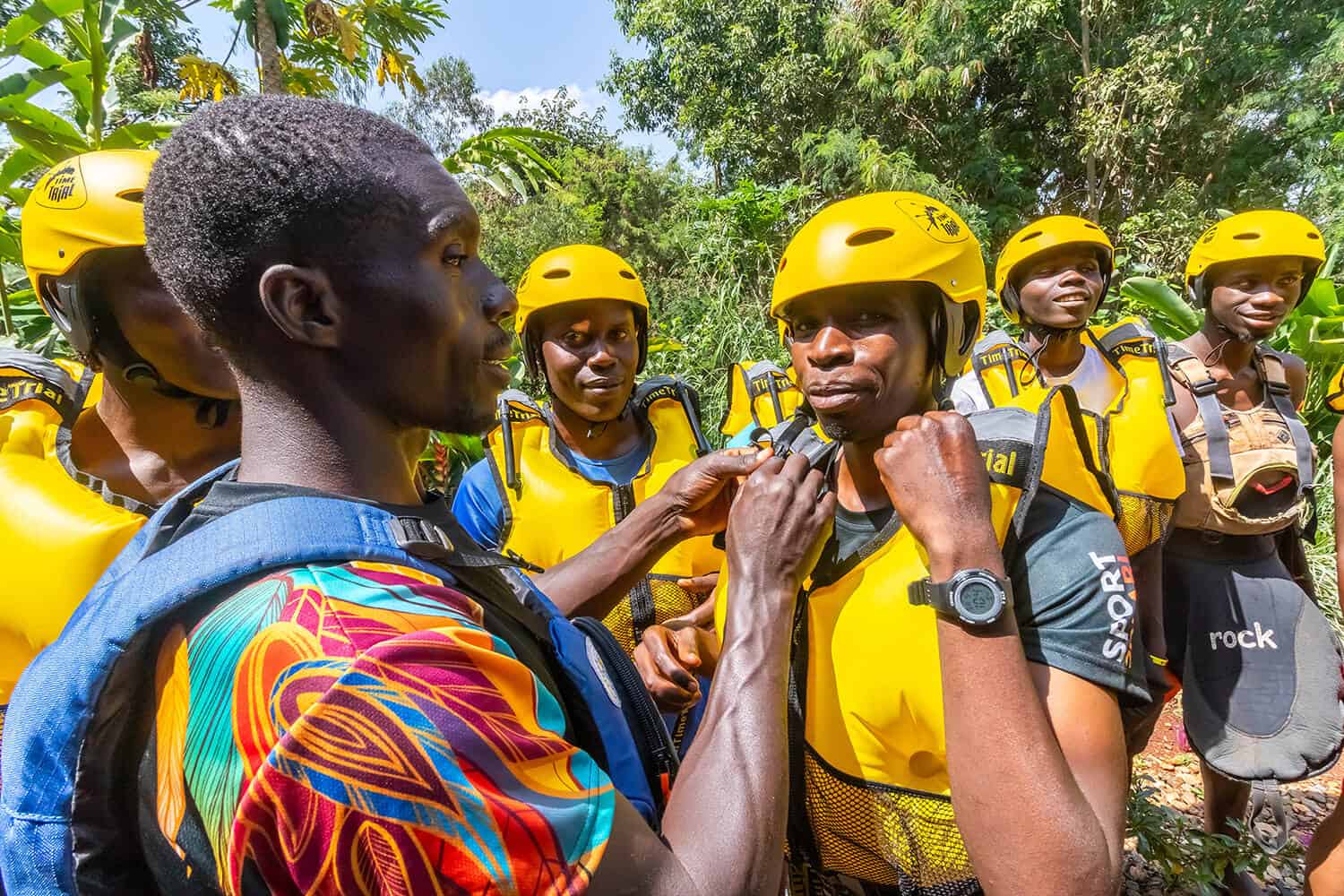 Guide giving a rafting safety briefing before a trip on the Nile River in Uganda