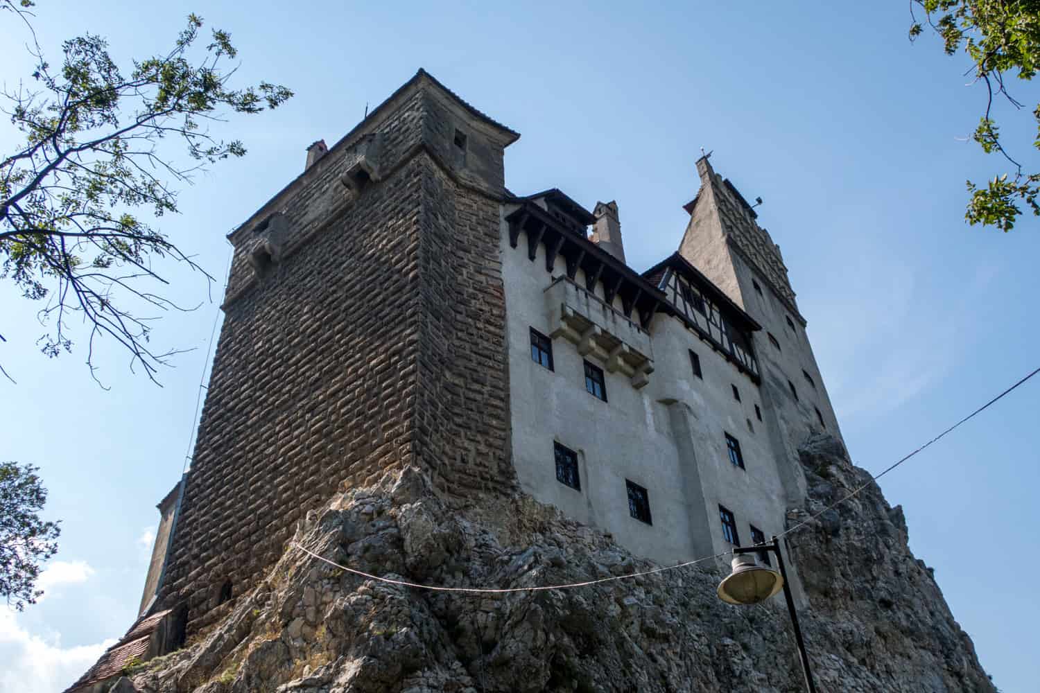 Bran Castle perched on rocky cliffs in Transylvania